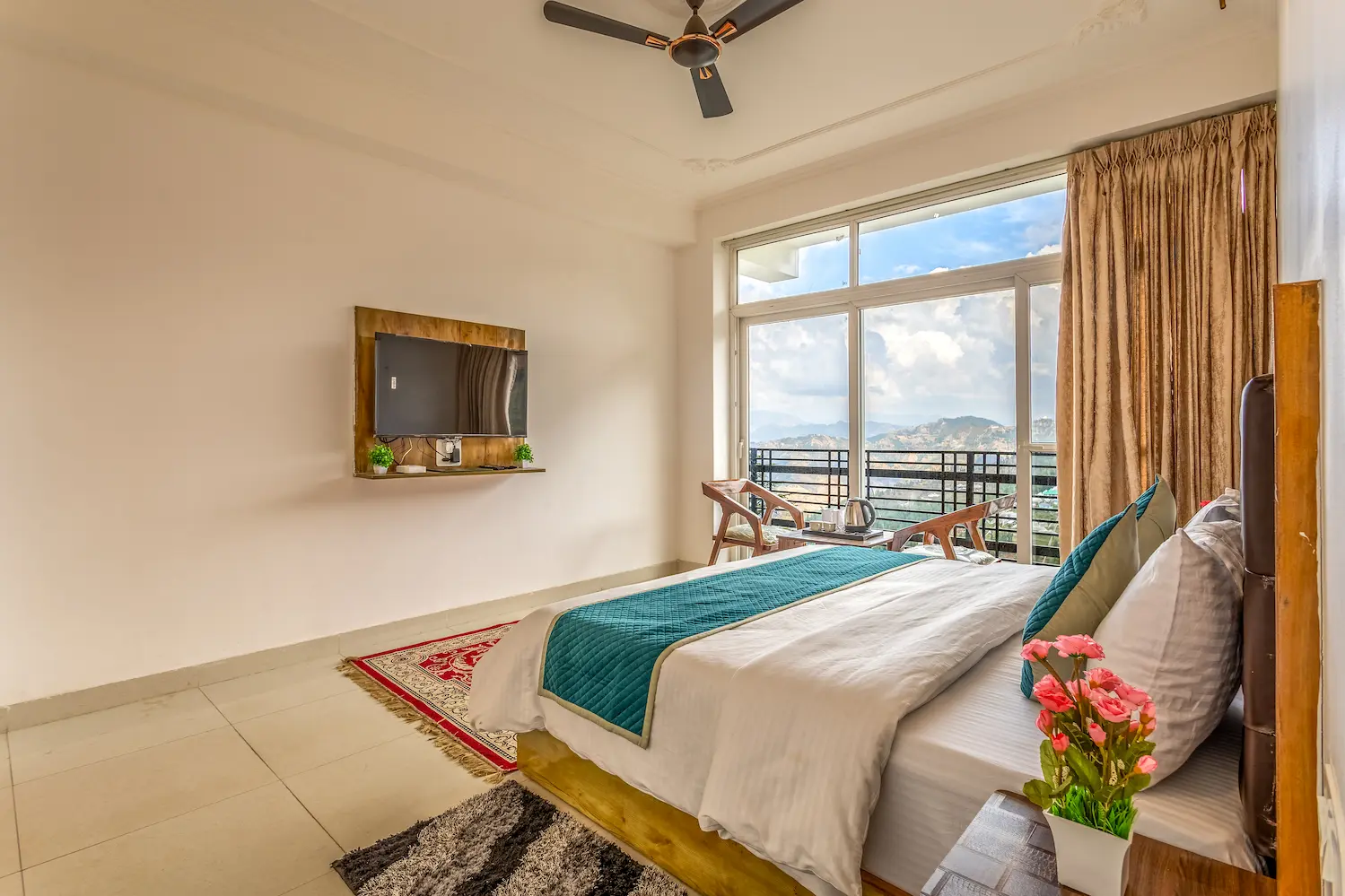 One of the first-floor rooms, each opening onto the shared valley-facing balcony