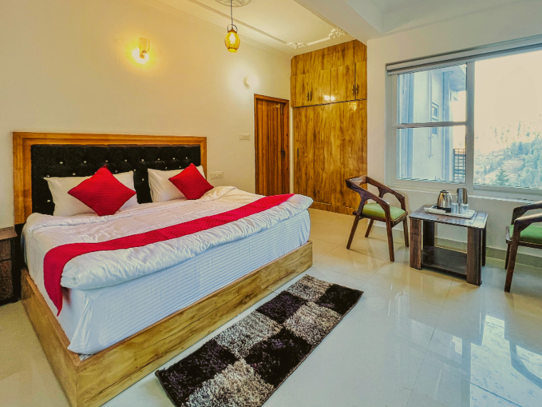 Family-friendly room with bed setup at VAMITAG Inn